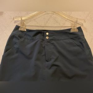 Navy blue golf skirt with shorts pockets